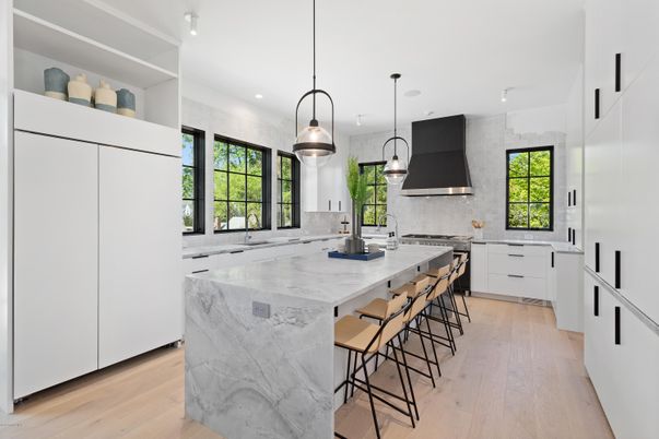 Interior, Kitchen, Marble Walls, Pendant Lights, Recessed Lighting, Stainless Steel Appliances, Wood Texture Flooring