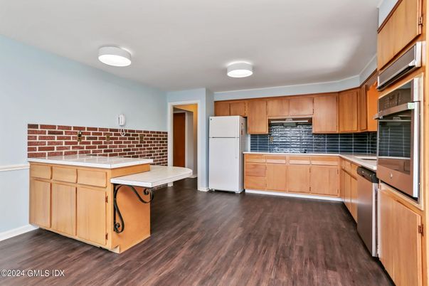 Interior, Kitchen, Tile Countertops, Wood Texture Flooring
