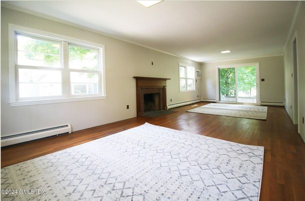 Empty room, Fireplace, Interior, Recessed Lighting, Wood Texture Flooring