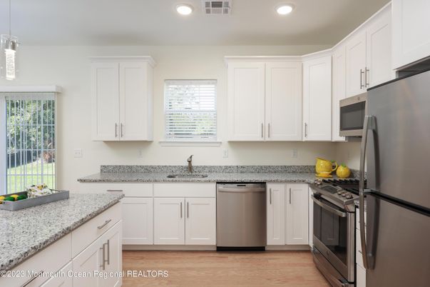 Interior, Kitchen, Recessed Lighting, Stainless Steel Appliances, Wood Texture Flooring