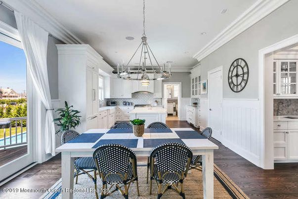 Chandelier, Dining room, Interior, Kitchen, Pendant Lights, Recessed Lighting, Stainless Steel Appliances, Wood Texture Flooring