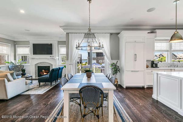 Dining room, Fireplace, Interior, Living room, Pendant Lights, Recessed Lighting, Wood Texture Flooring