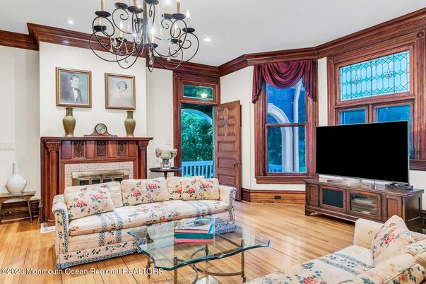 Chandelier, Fireplace, Interior, Living room, Recessed Lighting, Wood Texture Flooring