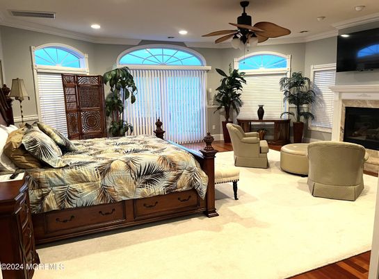 Bedroom, Fireplace, Interior, Recessed Lighting, Wood Texture Flooring