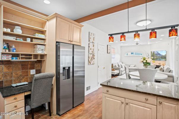 Dining room, Interior, Kitchen, Pendant Lights, Recessed Lighting, Stainless Steel Appliances, Wooden Beams, Wood Texture Flooring