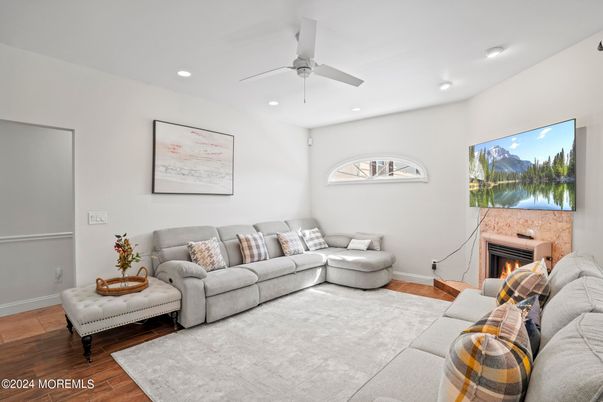 Fireplace, Interior, Living room, Recessed Lighting, Wood Texture Flooring