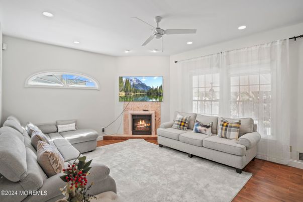 Fireplace, Interior, Living room, Recessed Lighting, Wood Texture Flooring