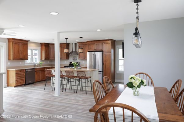 Dining room, Interior, Kitchen, Pendant Lights, Recessed Lighting, Stainless Steel Appliances, Wood Texture Flooring