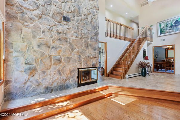 Fireplace, Interior, Recessed Lighting, Stone Walls, Wood Texture Flooring