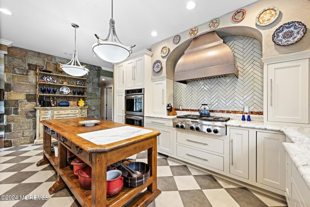 Interior, Kitchen, Pendant Lights, Recessed Lighting, Stainless Steel Appliances, Stone Walls