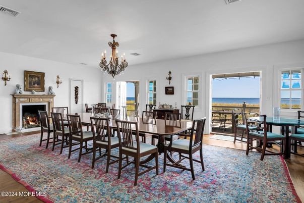 Chandelier, Dining room, Fireplace, Interior, Water, Wood Texture Flooring