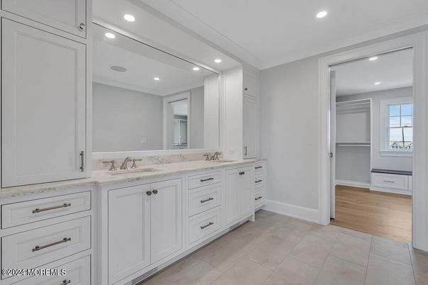 Bathroom, Dual Sink Vanities, Interior, Recessed Lighting, Wood Texture Flooring
