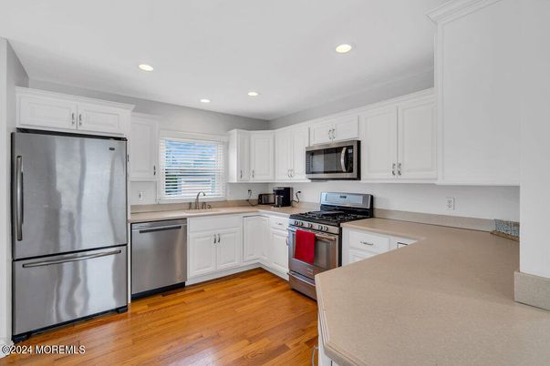 Interior, Kitchen, Recessed Lighting, Stainless Steel Appliances, Wood Texture Flooring