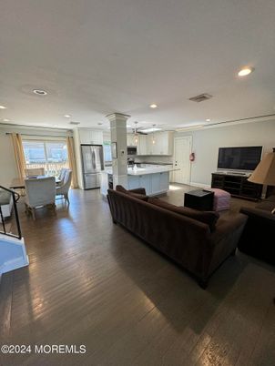 Dining room, Interior, Kitchen, Living room, Pendant Lights, Recessed Lighting, Stainless Steel Appliances, Wood Texture Flooring