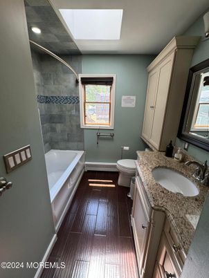 Bathroom, Dual Sink Vanities, Interior, Recessed Lighting, Wood Texture Flooring