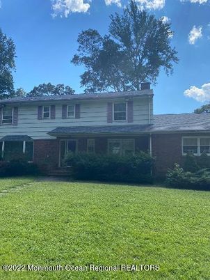 Backyard, Exterior, Facade, Brick Facade, Raised Ranch