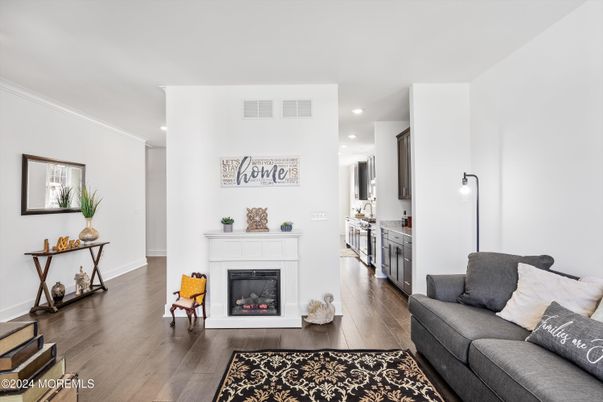 Fireplace, Interior, Kitchen, Living room, Recessed Lighting, Wood Texture Flooring