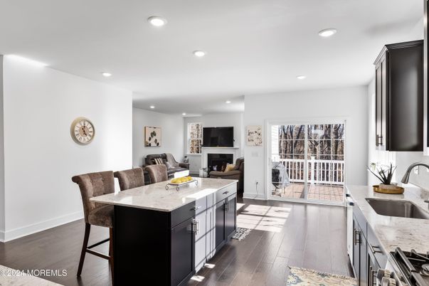Fireplace, Interior, Kitchen, Recessed Lighting, Wood Texture Flooring