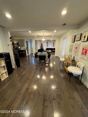 Chandelier, Dining room, Interior, Kitchen, Pendant Lights, Recessed Lighting, Stainless Steel Appliances, Wood Texture Flooring