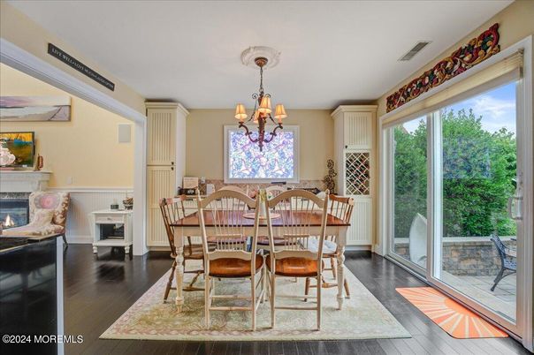 Chandelier, Dining room, Fireplace, Interior, Wood Texture Flooring