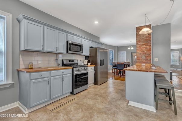 Dining room, Interior, Kitchen, Pendant Lights, Recessed Lighting, Stainless Steel Appliances, Stone Walls