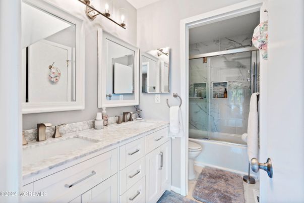 Bathroom, Dual Sink Vanities, Glass Shower, Interior, Marble Walls