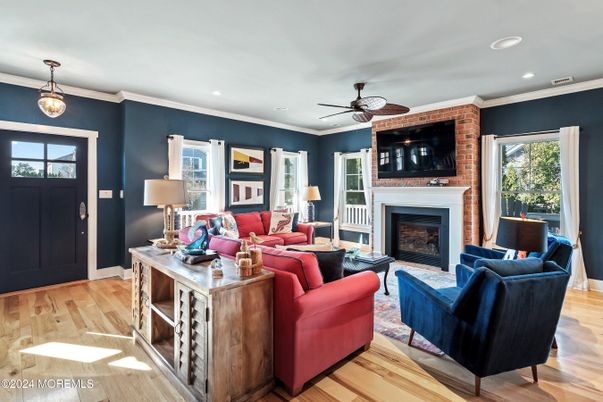Fireplace, Interior, Living room, Pendant Lights, Recessed Lighting, Stone Walls, Wood Texture Flooring