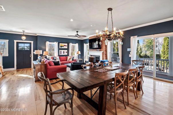 Dining room, Fireplace, Interior, Living room, Pendant Lights, Recessed Lighting, Wood Texture Flooring
