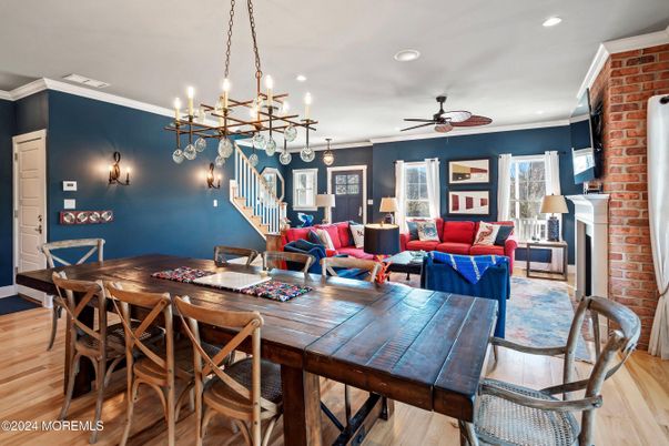Dining room, Fireplace, Interior, Living room, Pendant Lights, Recessed Lighting, Stone Walls, Wood Texture Flooring