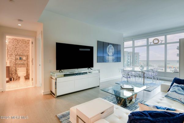 Bathroom, Dining room, Interior, Living room, Recessed Lighting, Water, Wood Texture Flooring