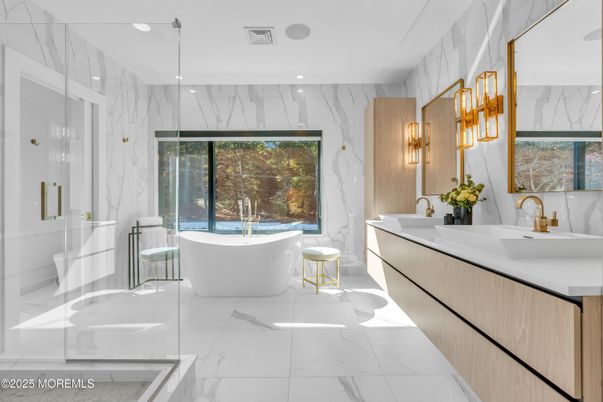 Bathroom, Dual Sink Vanities, Free Standing Baths, Glass Shower, Interior, Marble, Marble Walls, Recessed Lighting
