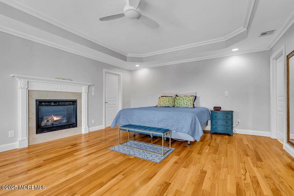 Bedroom, Fireplace, Interior, Recessed Lighting, Wood Texture Flooring