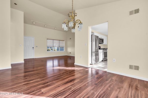 Chandelier, Empty room, Interior, Kitchen, Stainless Steel Appliances, Wood Texture Flooring