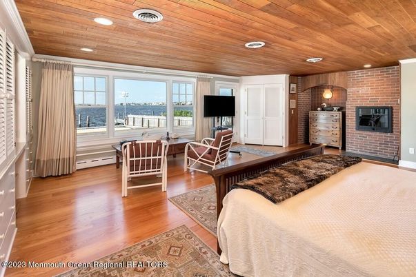 Interior, Living room, Recessed Lighting, Stone Walls, Water, Wooden Ceilings, Wood Texture Flooring