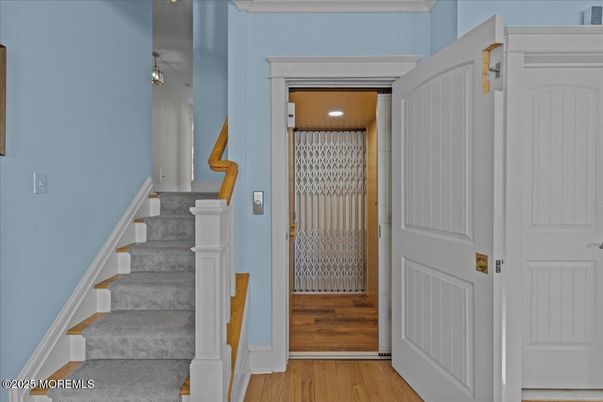 Elevator, Interior, Recessed Lighting, Wood Texture Flooring