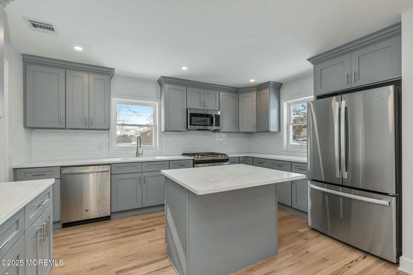 Interior, Kitchen, Recessed Lighting, Stainless Steel Appliances, Wood Texture Flooring