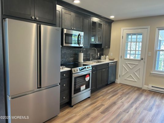 Interior, Kitchen, Recessed Lighting, Stainless Steel Appliances, Wood Texture Flooring