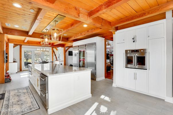 Chandelier, Interior, Kitchen, Pendant Lights, Recessed Lighting, Stainless Steel Appliances, Wooden Beams, Wooden Ceilings