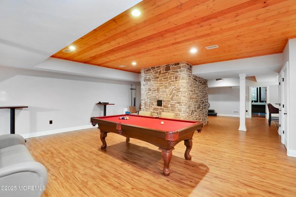 Billiard Table, Fireplace, Game Room, Interior, Recessed Lighting, Stone Walls, Wooden Ceilings, Wood Texture Flooring