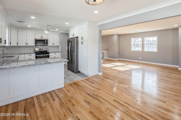 Interior, Kitchen, Recessed Lighting, Stainless Steel Appliances, Wood Texture Flooring