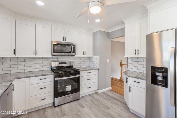 Interior, Kitchen, Recessed Lighting, Stainless Steel Appliances, Wood Texture Flooring