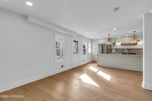 Chandelier, Interior, Kitchen, Pendant Lights, Recessed Lighting, Stainless Steel Appliances, Wood Texture Flooring