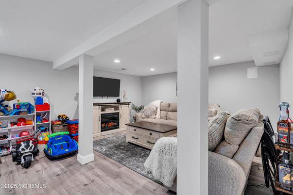 Fireplace, Interior, Living room, Recessed Lighting, Wood Texture Flooring