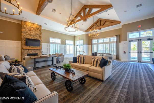 Chandelier, Fireplace, Interior, Living room, Recessed Lighting, Stone Walls, Wooden Beams