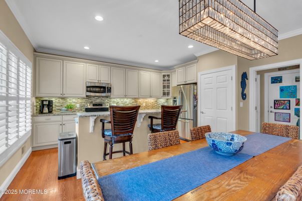 Chandelier, Interior, Kitchen, Recessed Lighting, Stainless Steel Appliances, Wood Texture Flooring