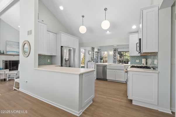 Interior, Kitchen, Pendant Lights, Recessed Lighting, Stainless Steel Appliances, Wood Texture Flooring