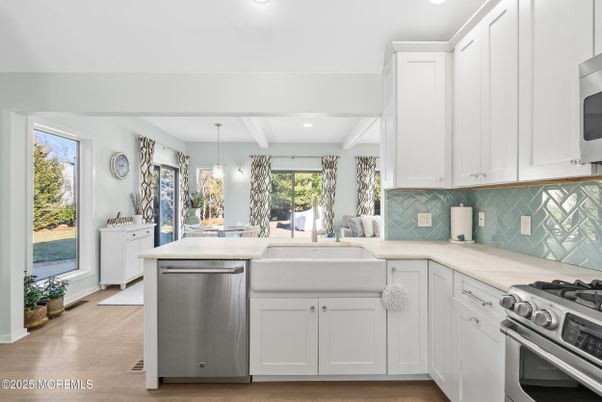 Dining room, Interior, Kitchen, Pendant Lights, Recessed Lighting, Stainless Steel Appliances, Wood Texture Flooring