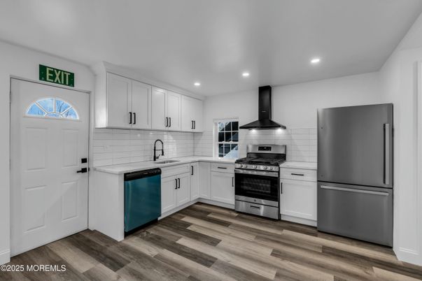 Interior, Kitchen, Recessed Lighting, Stainless Steel Appliances, Wood Texture Flooring