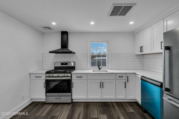 Interior, Kitchen, Recessed Lighting, Stainless Steel Appliances, Wood Texture Flooring