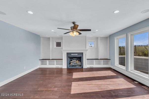 Empty room, Fireplace, Interior, Recessed Lighting, Wood Texture Flooring